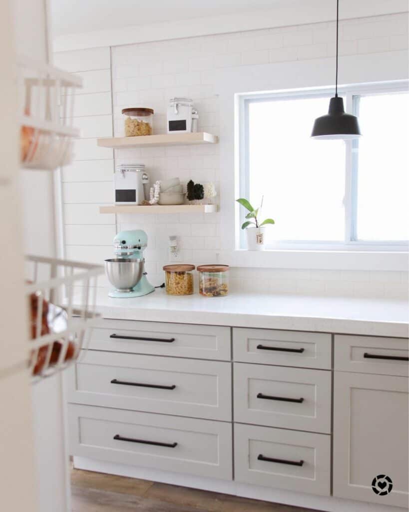 Minimalist White Kitchen With Black Hardware