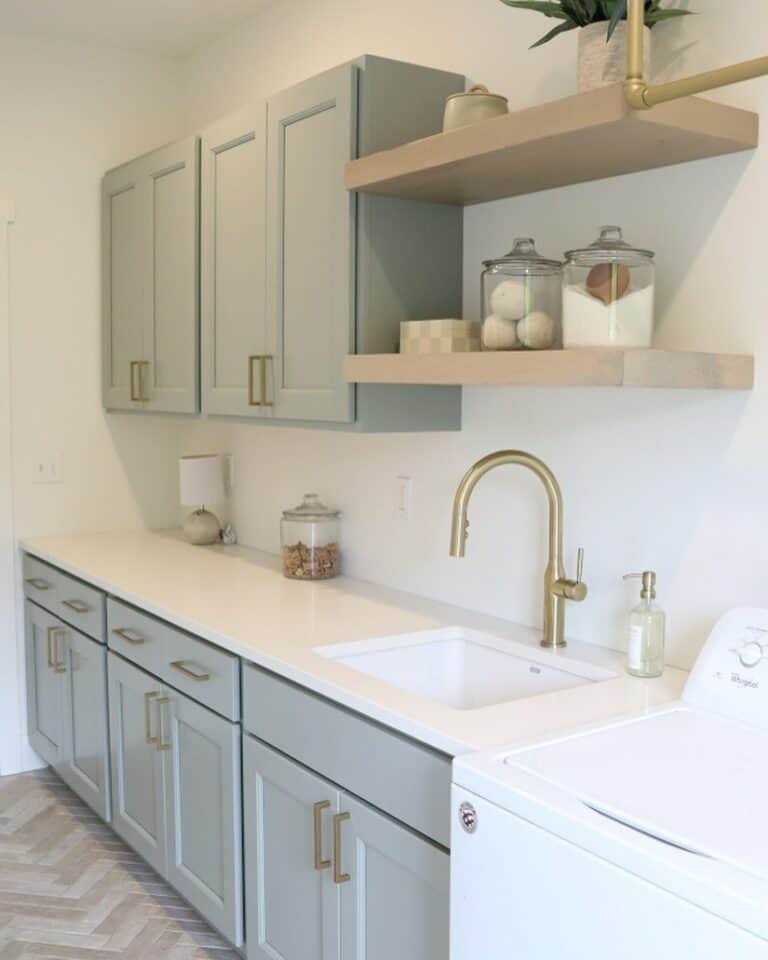 Mint Green Laundry Room Cabinets With Gold Hardware