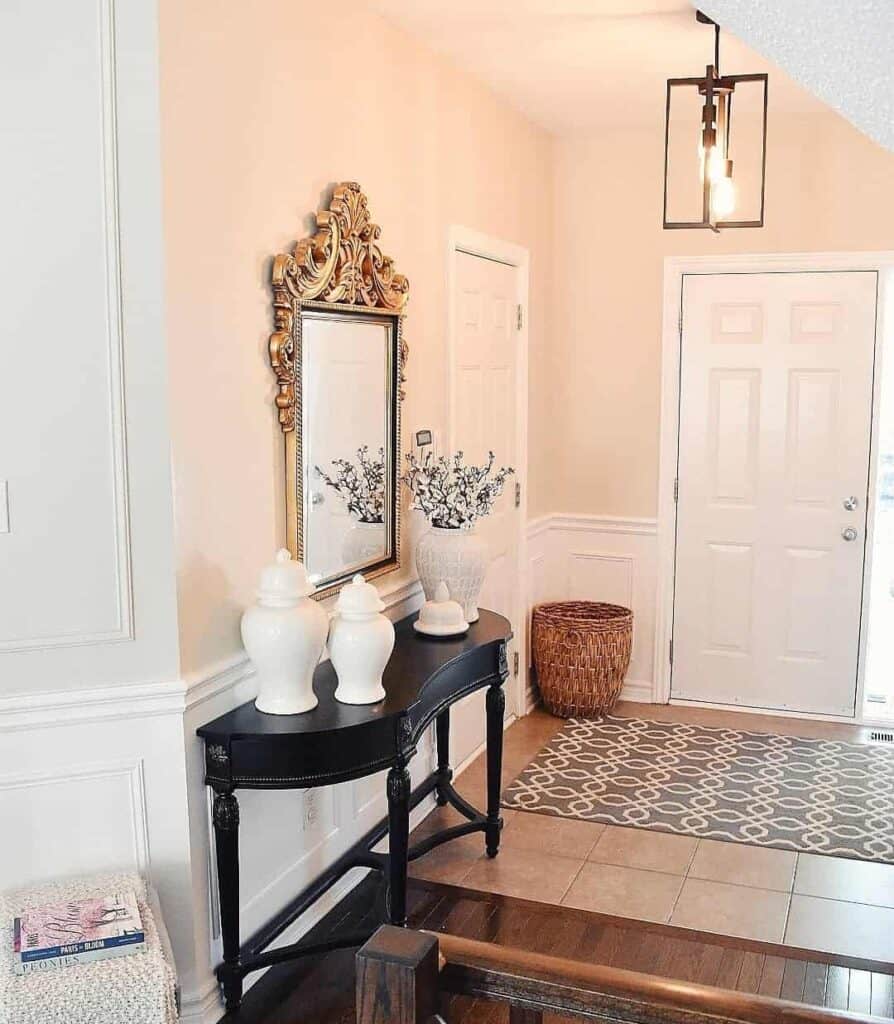 Modern Entryway With Golden Accents