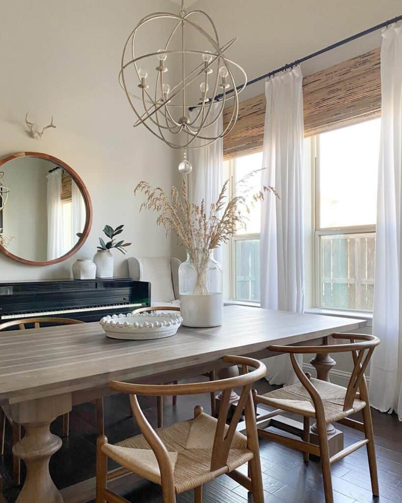 Modern Farmhouse Dining Room With Large Mounted Mirror
