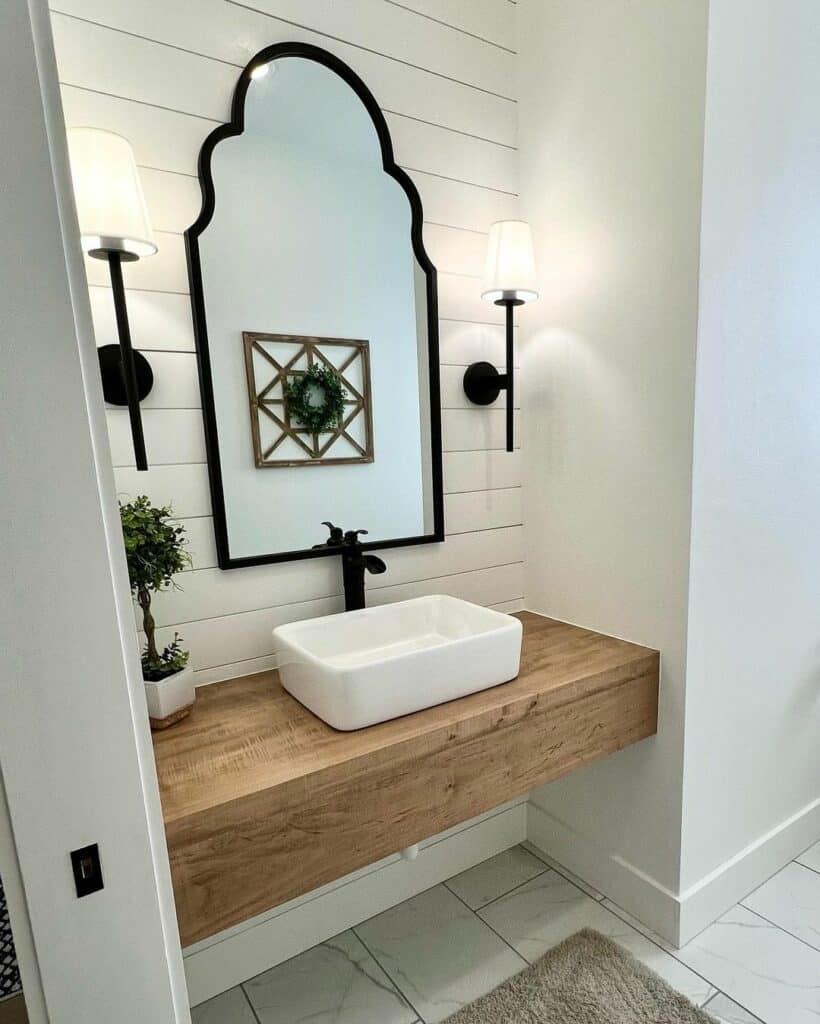 Modern Powder Room With Sleek Black Elements