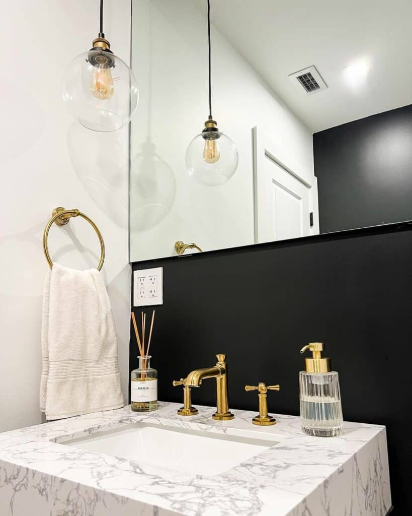 Modern and Luxurious Powder Room with Gold Accents