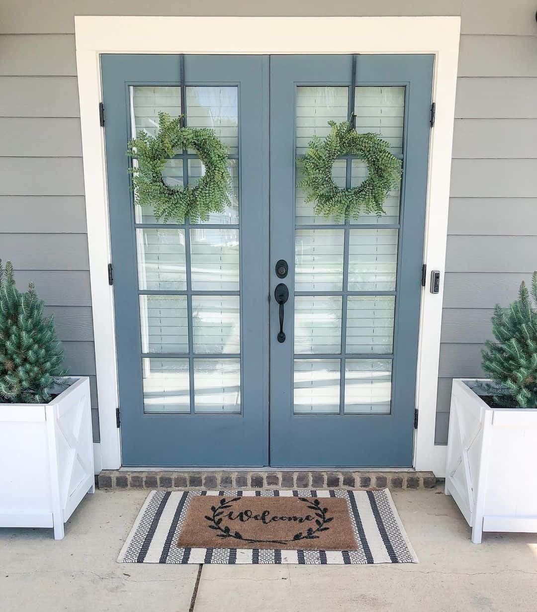 Muted Blue French Doors With Green Wreaths Soul & Lane