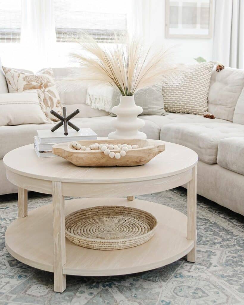 Natural Wood Round Coffee Table with Modern Accents