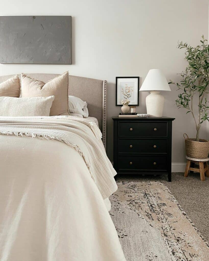 Neutral Bedroom With Black Nightstand