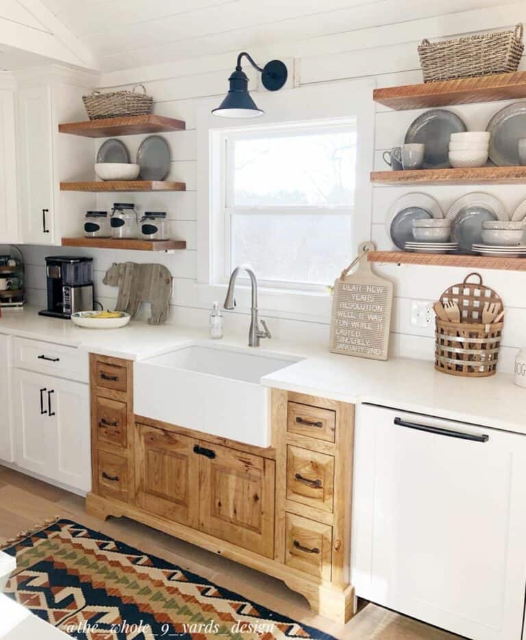 Neutral Kitchen With White Cabinets and Dark Hardware
