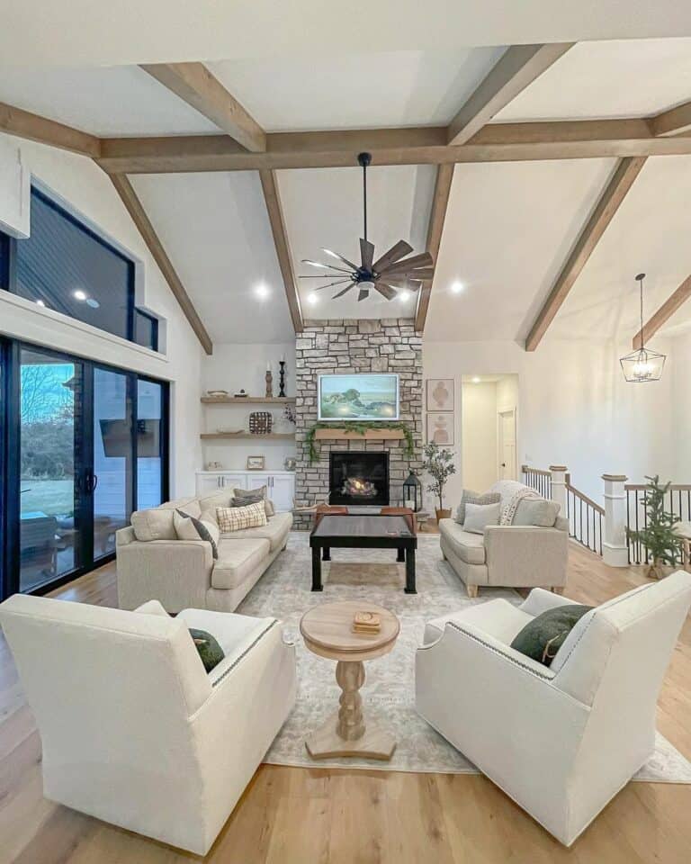 Neutral Open-Concept Living Room with Vaulted Ceiling