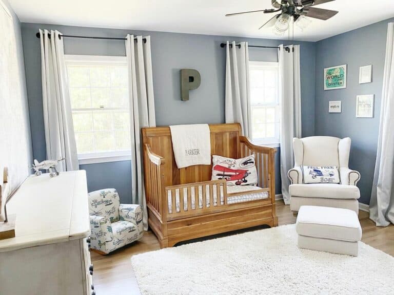 Nursery with Blue Accent Wall Decor