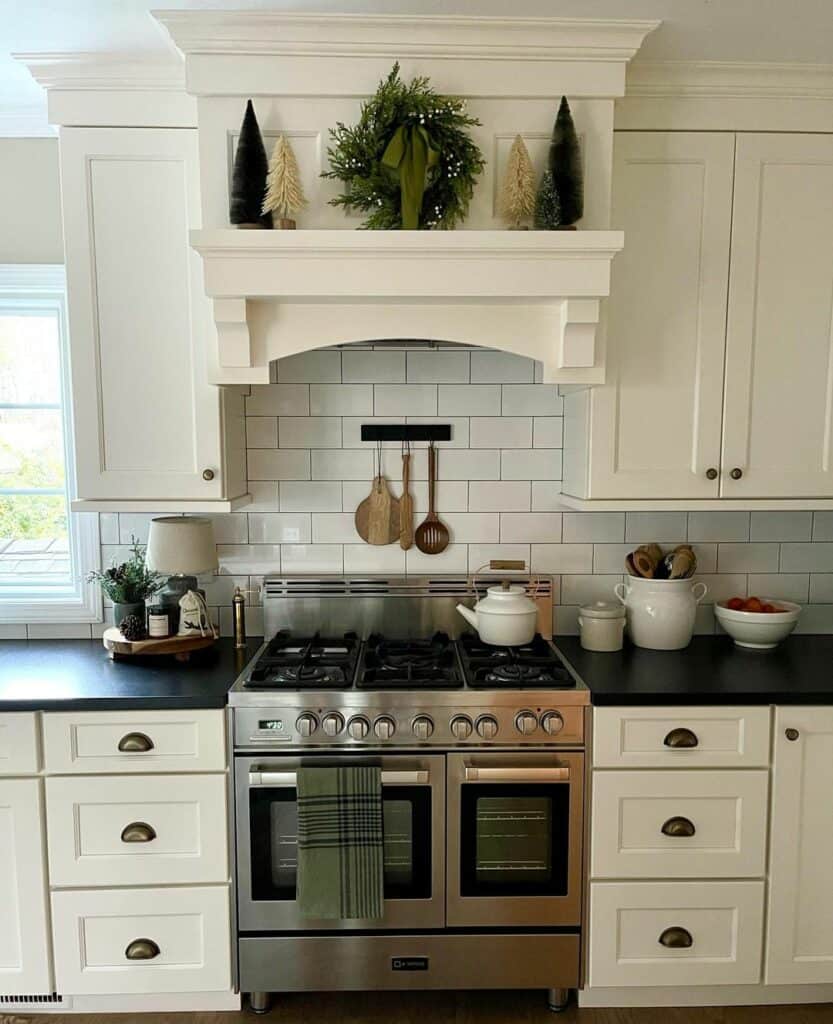 Off-White Kitchen Cabinets with Black Countertop