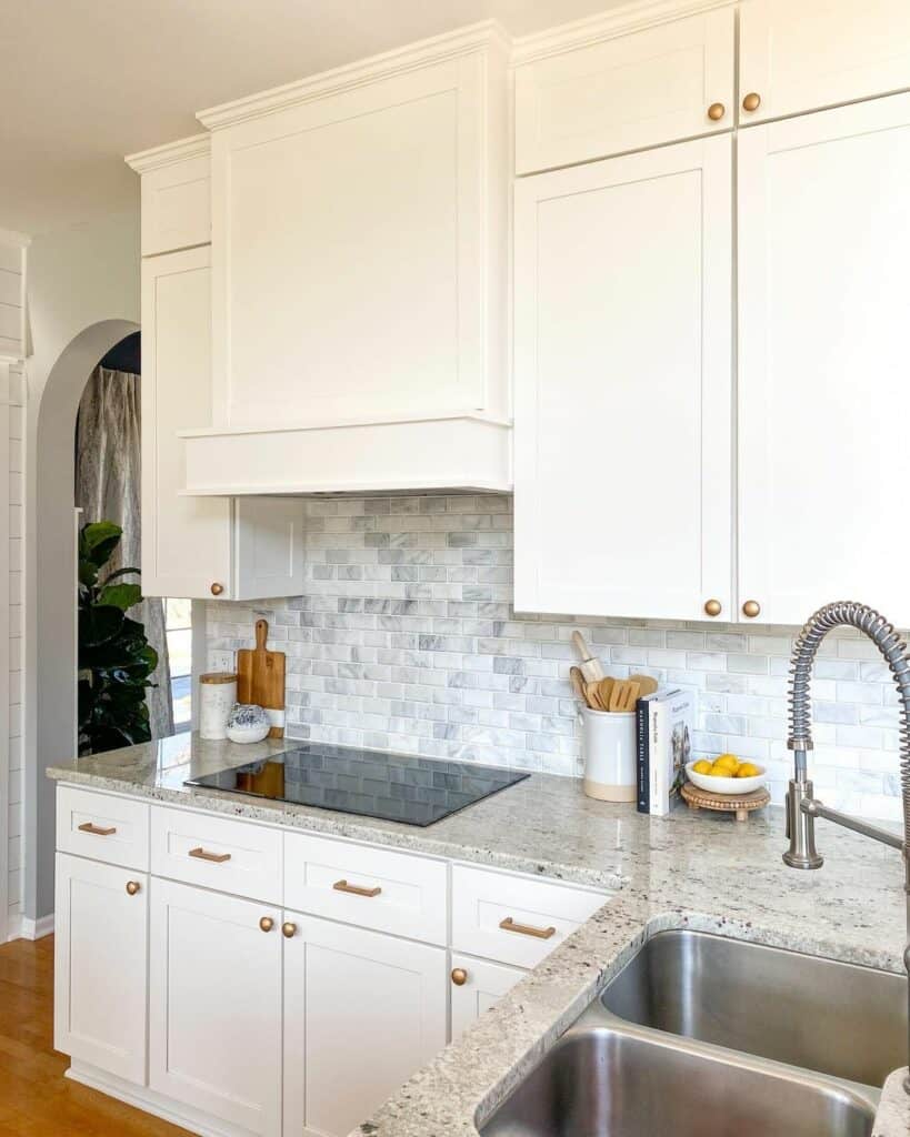 Off-White Kitchen Cabinets with Brass Hardware