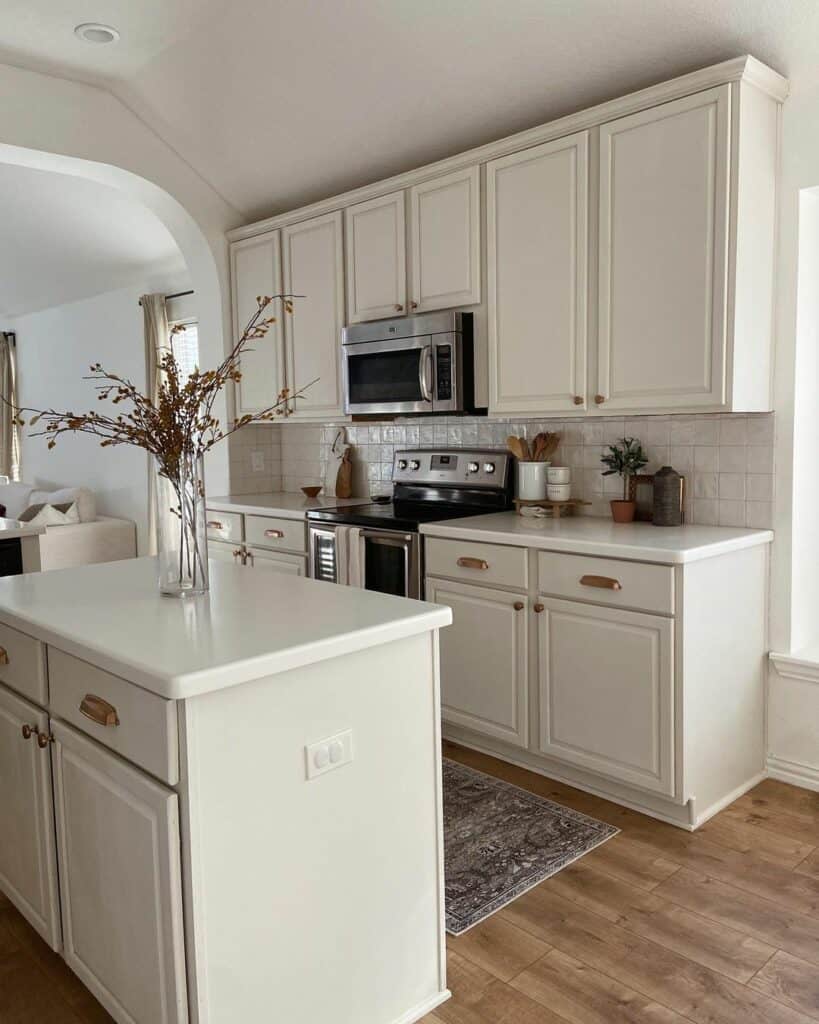 Off-White Kitchen Cabinets with Brass Hardware