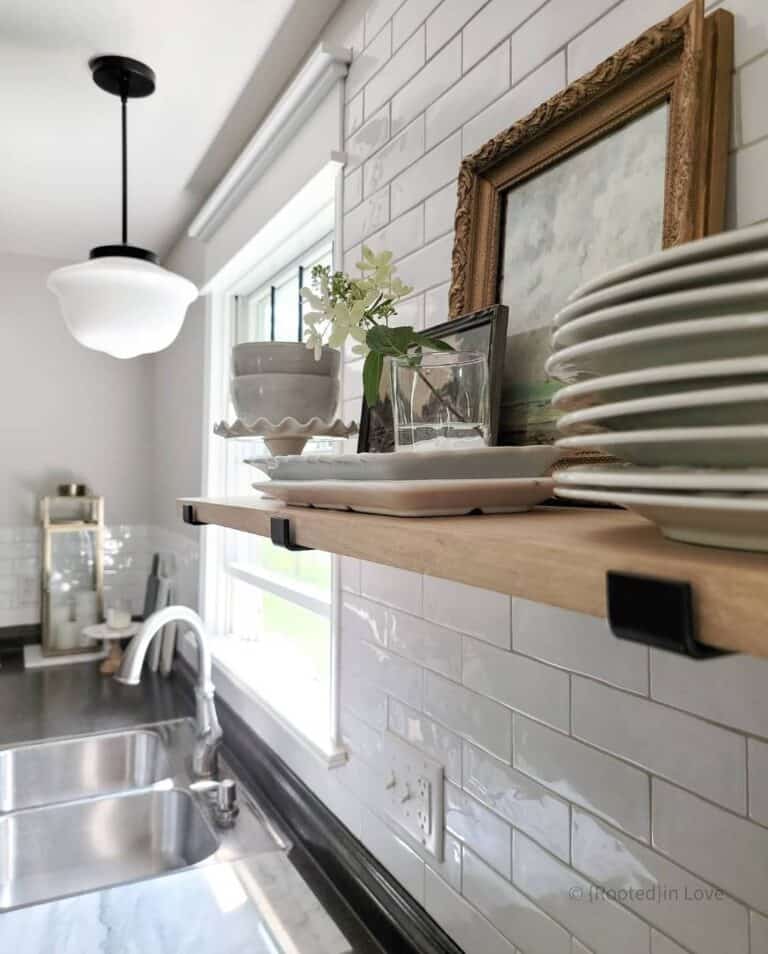 Open-Wood Shelf on a Bright White Subway Tile Wall