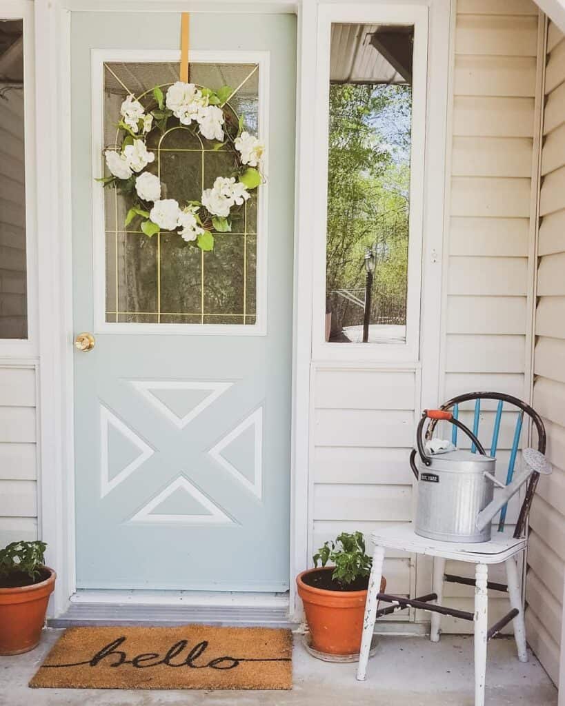 Pale Green Door with White Flower Wreath