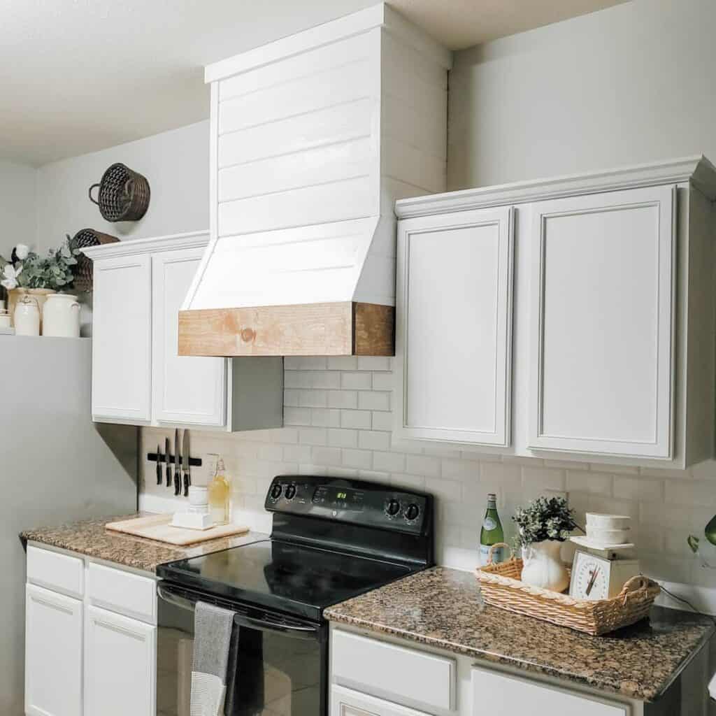 Partial Overlay Cabinets Around White Range Hood