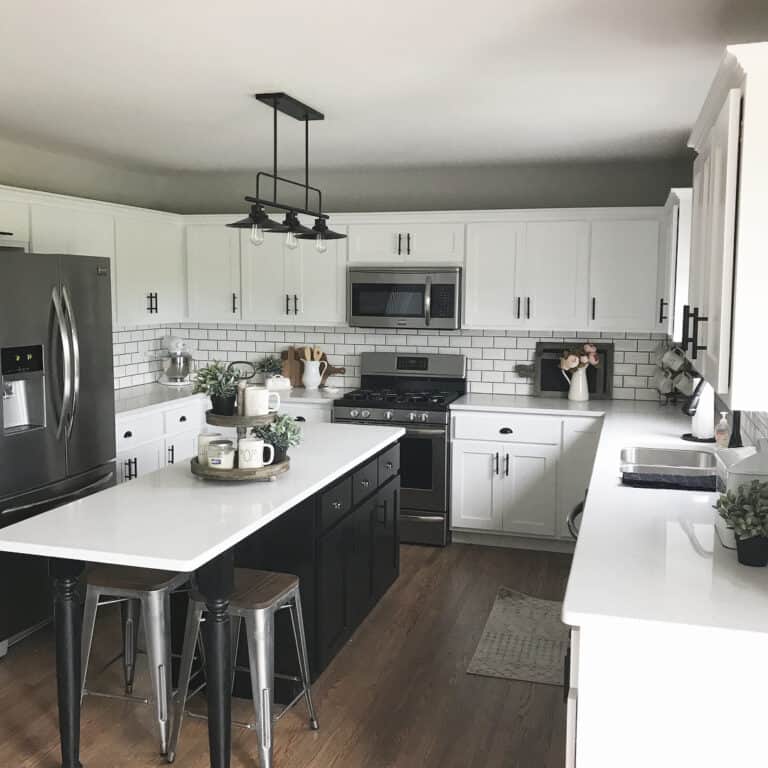 Plain White Subway Tile Between White Cabinets