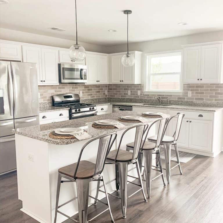 Red Brick Subway Tile and Gray Counters