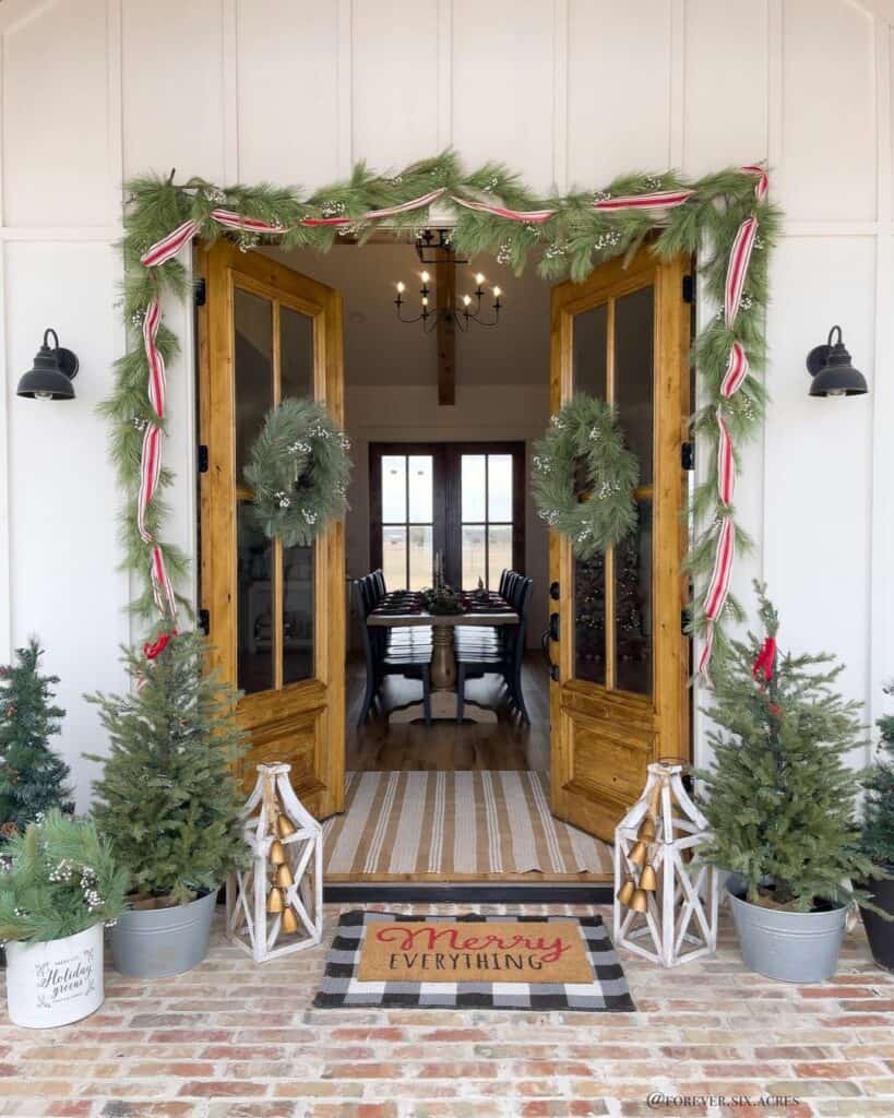 Red and White Ribbon Twined Around a Green Garland