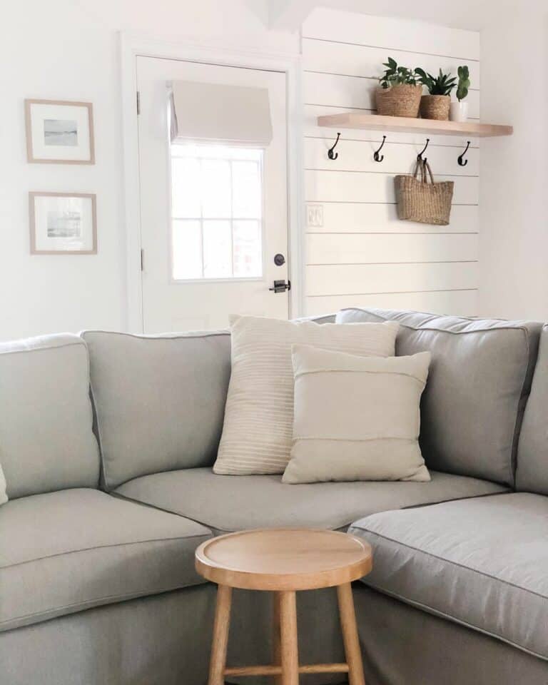 Round Coffee Table with a Gray Sectional Sofa