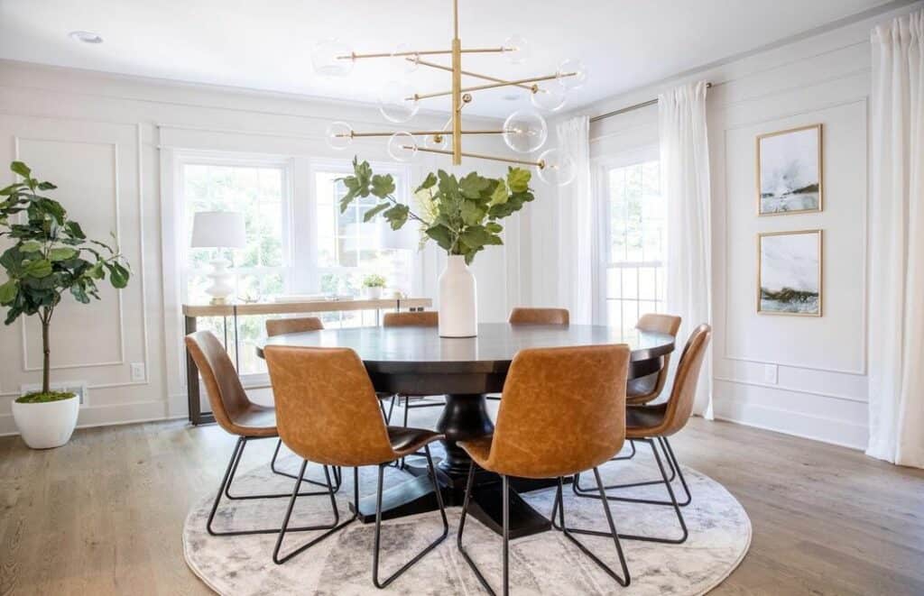 Round Dining Room Table With Leafy Centerpiece