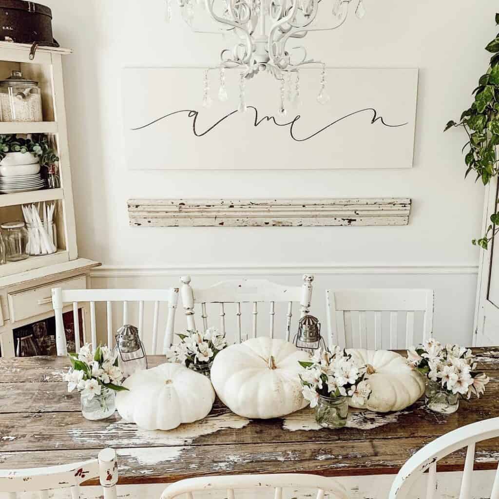 Rustic Dining Space with Pumpkin Centerpiece