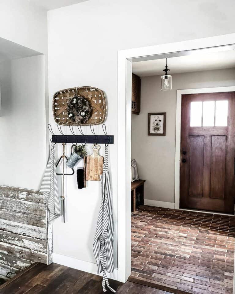 Rustic Entryway With Brick-style Floor