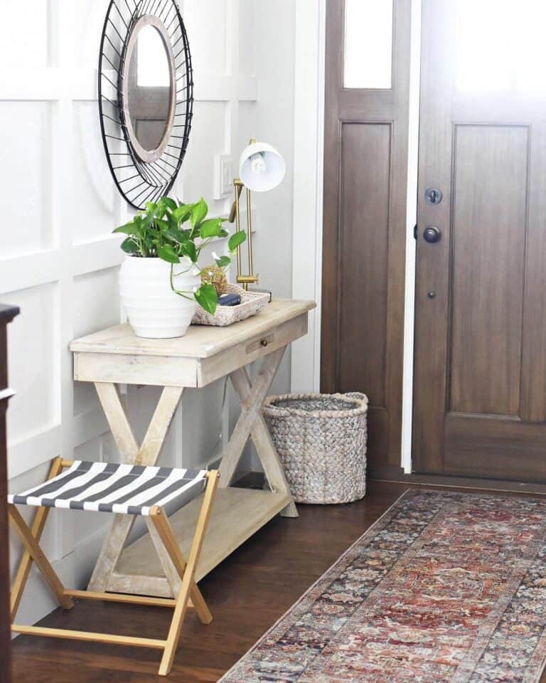 Rustic Entryway With Vibrant Rug