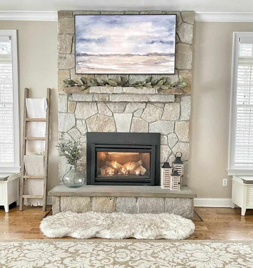 Rustic Stone Fireplace and Wall Mounted TV