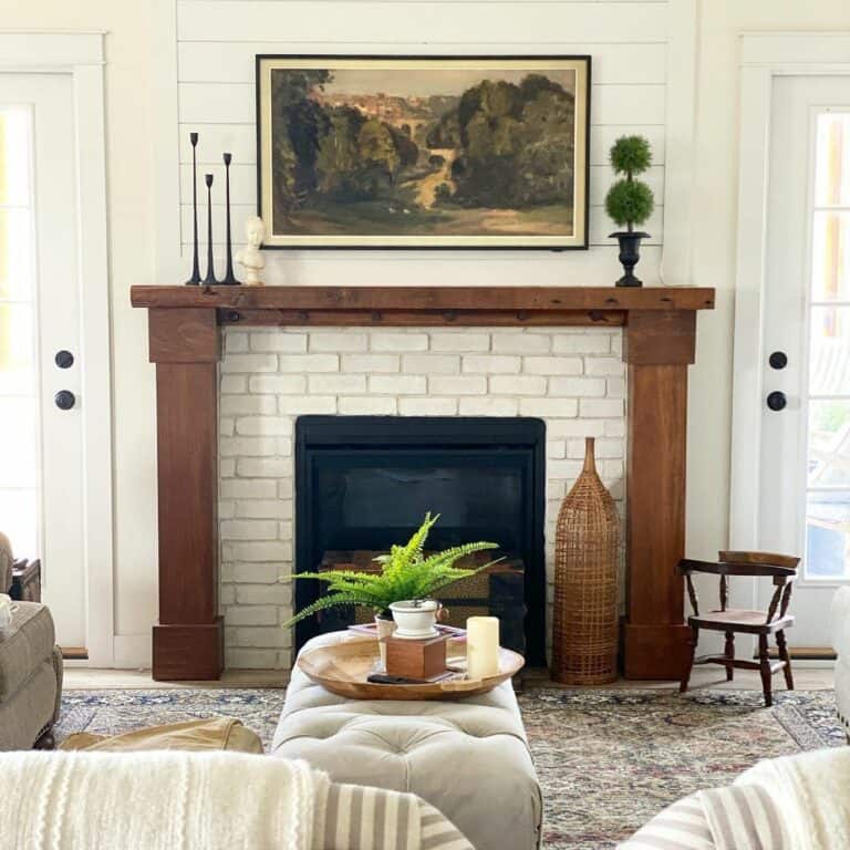 Rustic Wooden Mantel with White Brick Fireplace