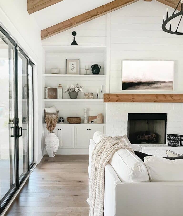 Shiplap Fireplace Wall Beneath Vaulted Ceilings