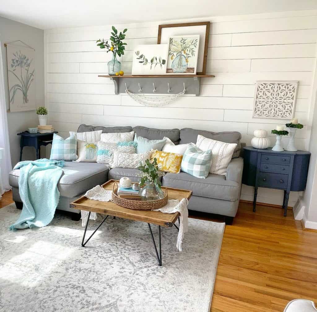 Shiplap Paneling Wall With Accent Pillows