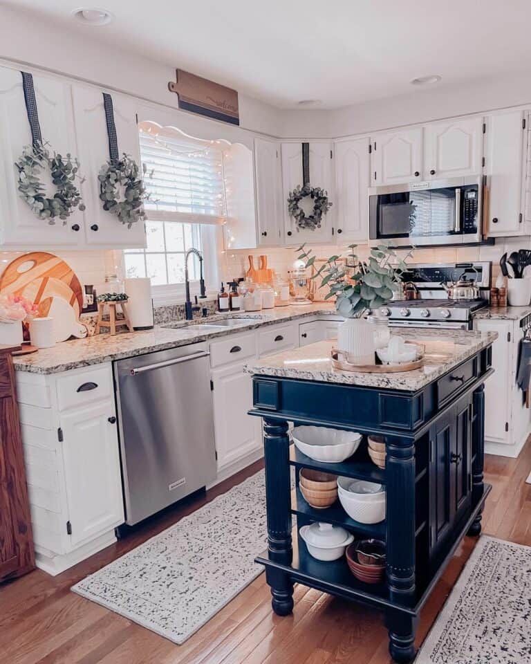Small Kitchen Island Flanked by Patterned Mats
