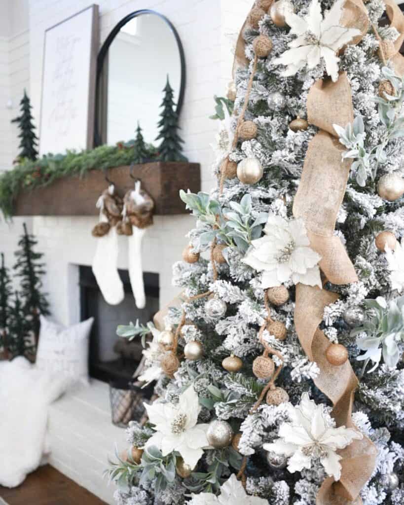 Sophisticated Tree With Gold Ornaments and a Burlap Christmas Ribbon