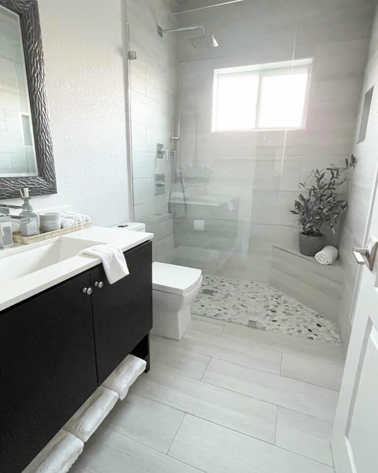 https://www.soulandlane.com/wp-content/uploads/2023/01/Stone-Floor-Doorless-Shower-with-Greenery-768x960.jpg