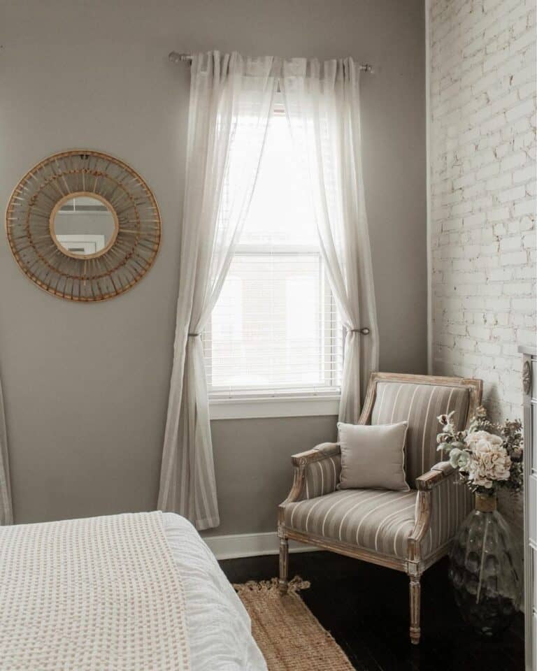 Striped Chair in Brick Accent Bedroom