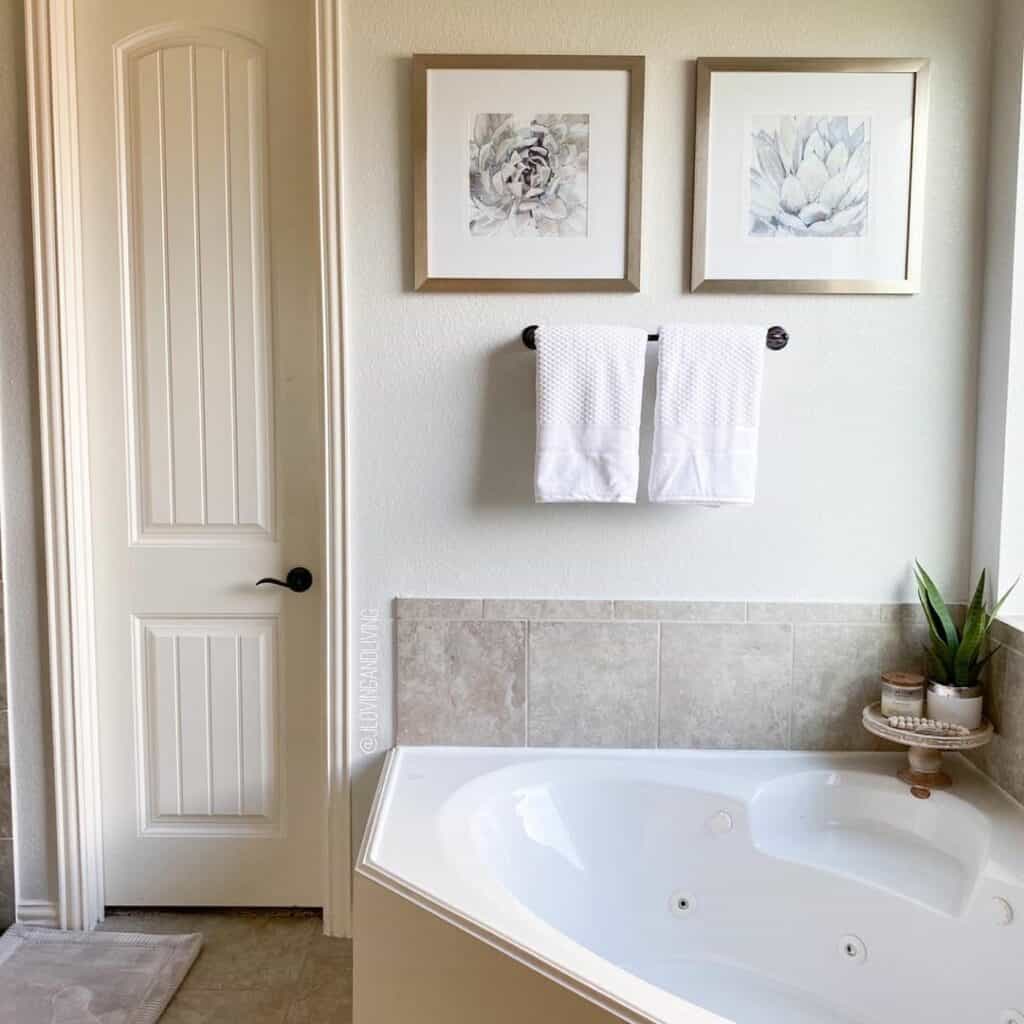 Taupe Tile Bathroom With a Large Soaking Tub