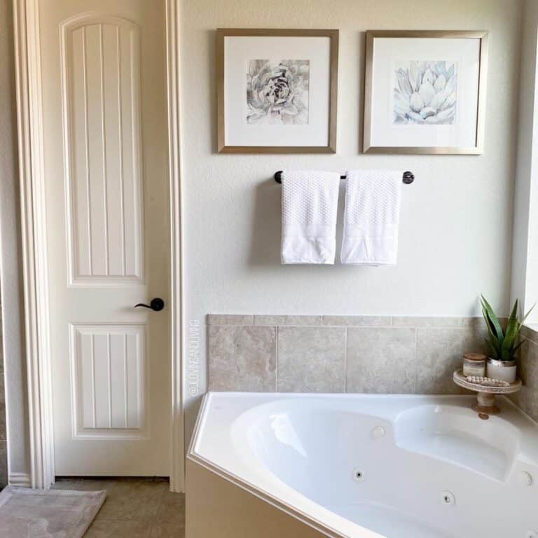 Taupe Tile Bathroom With a Large Soaking Tub