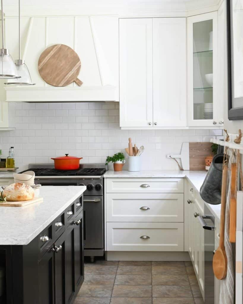 Two-tone Tile Surrounds Black Kitchen Island