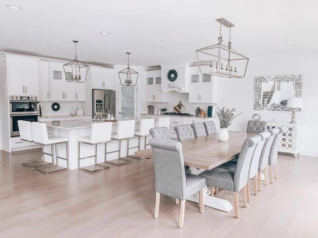 Two-toned Farmhouse Table With Gray Upholstered Chairs