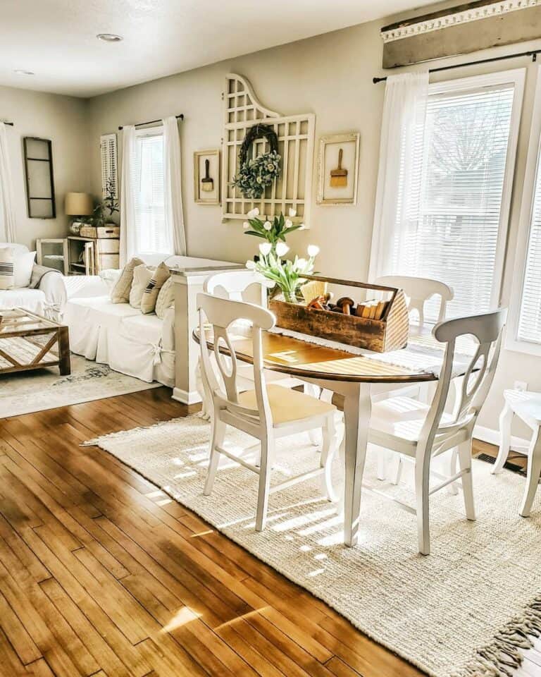 Two-toned White Dining Table on Tasseled Jute Rug