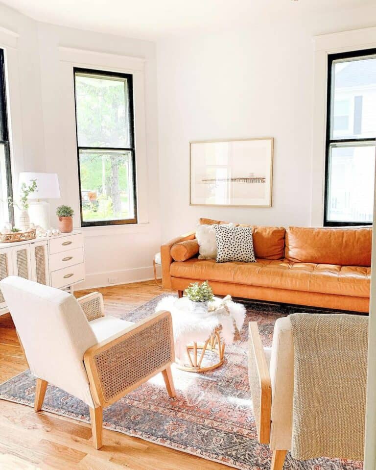 Uniquely Shaped Living Room with Tan Sofa