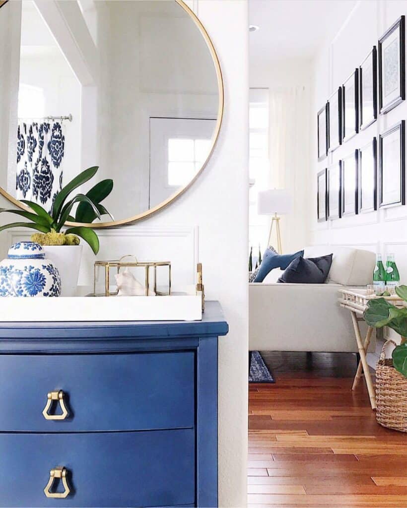 Vibrant Blue Dresser with Gold Accents