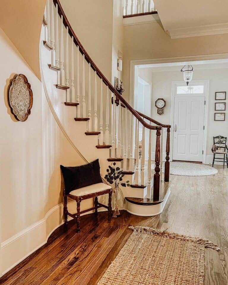 Vintage Foyer Features Winding Staircase