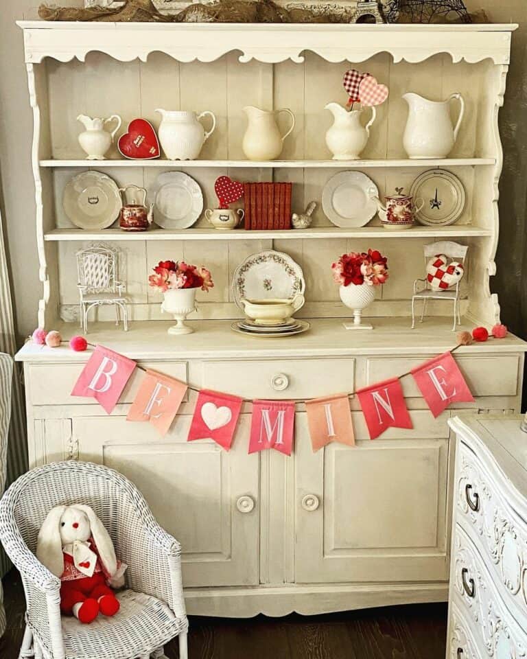 Vintage Hutch With Pink and Red Décor