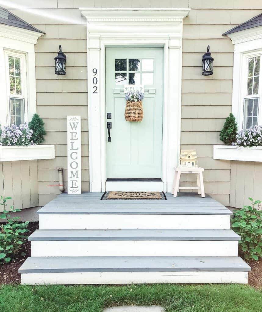 Welcoming Cottage Porch With Gray Front Steps