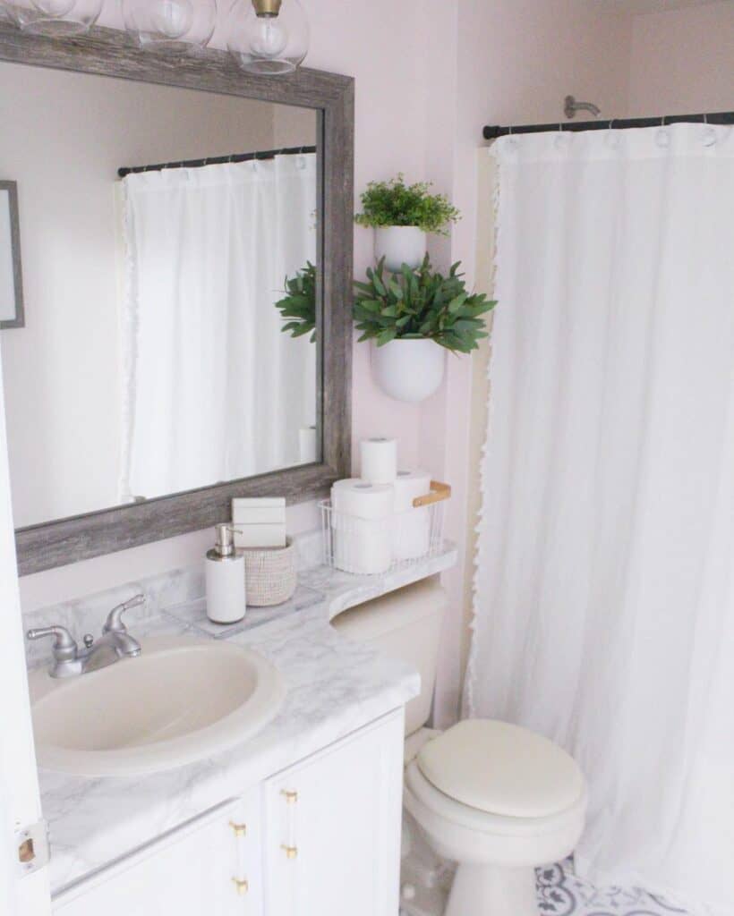 Whimsical Guest Bathroom Ideas With Pink and Marble Accents