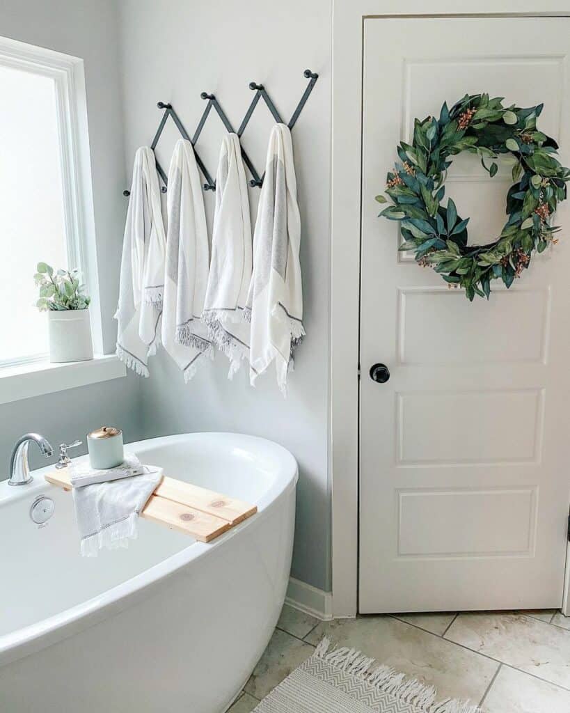 White Bathroom Door with Green Wreath