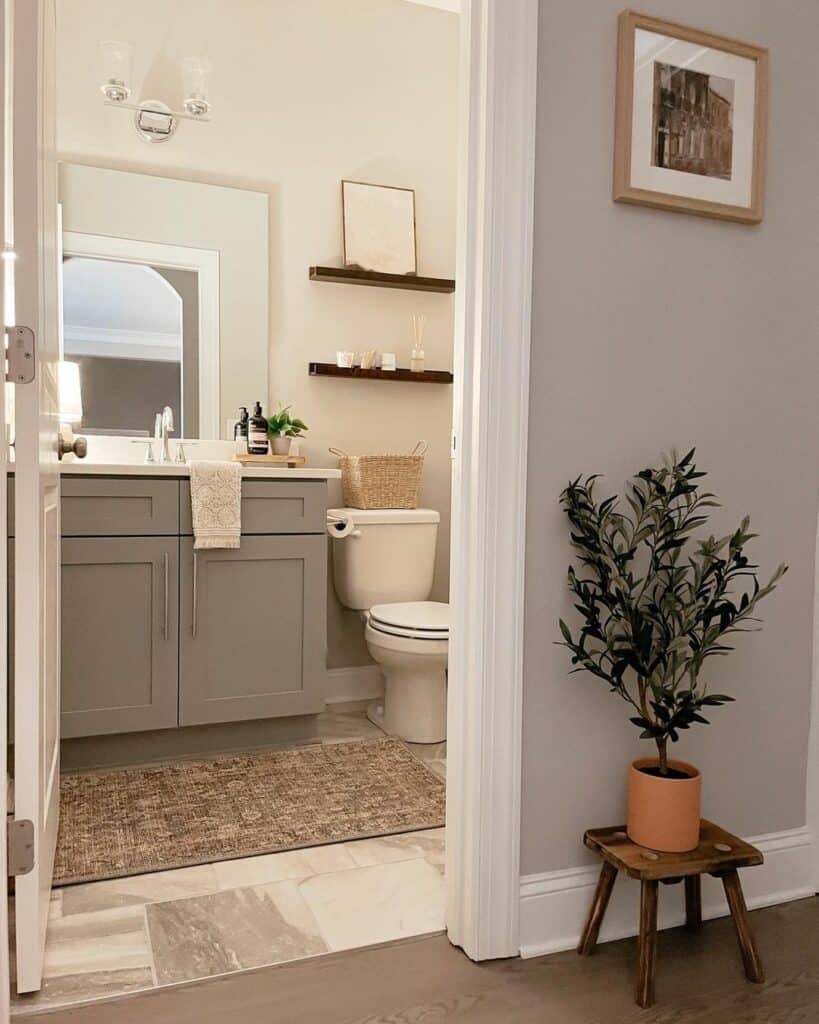 White Bathroom With a Grey Vanity and Neutral Décor