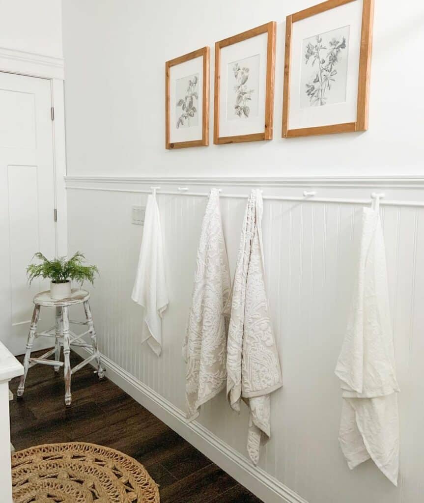 White Beadboard Half Wall with Towel Hooks