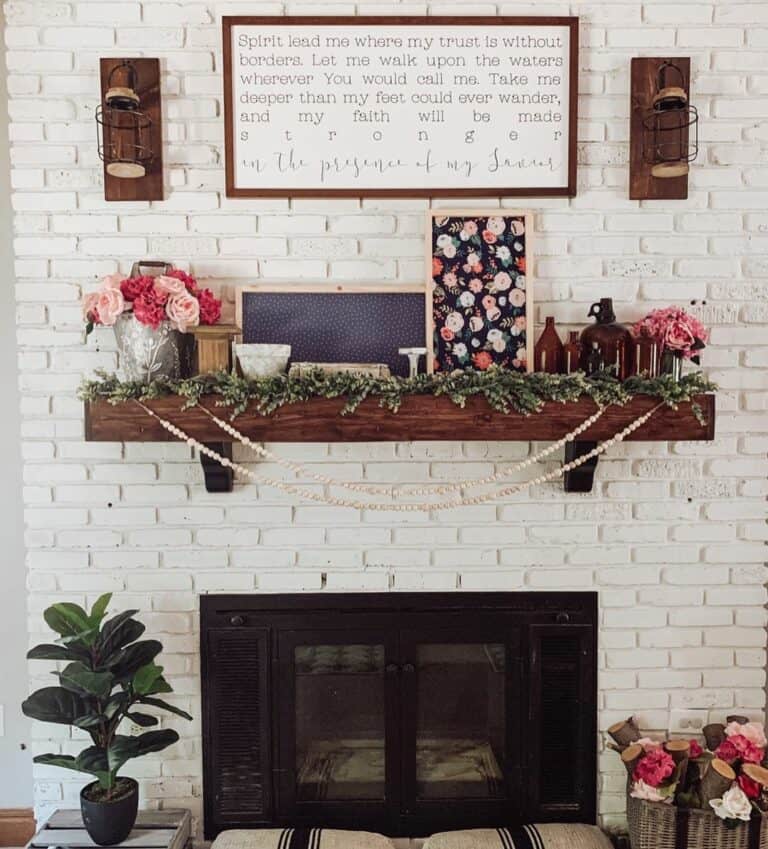 White Brick Fireplace with Dark Wood Mantel