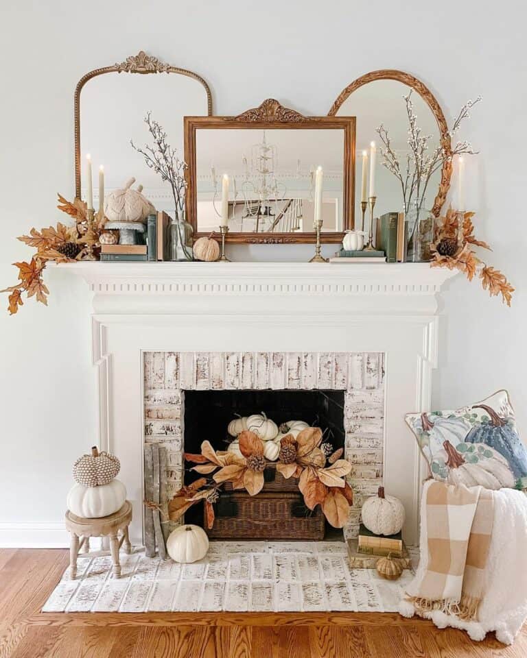 White Brick Fireplace with Gold Filigree Mirrors